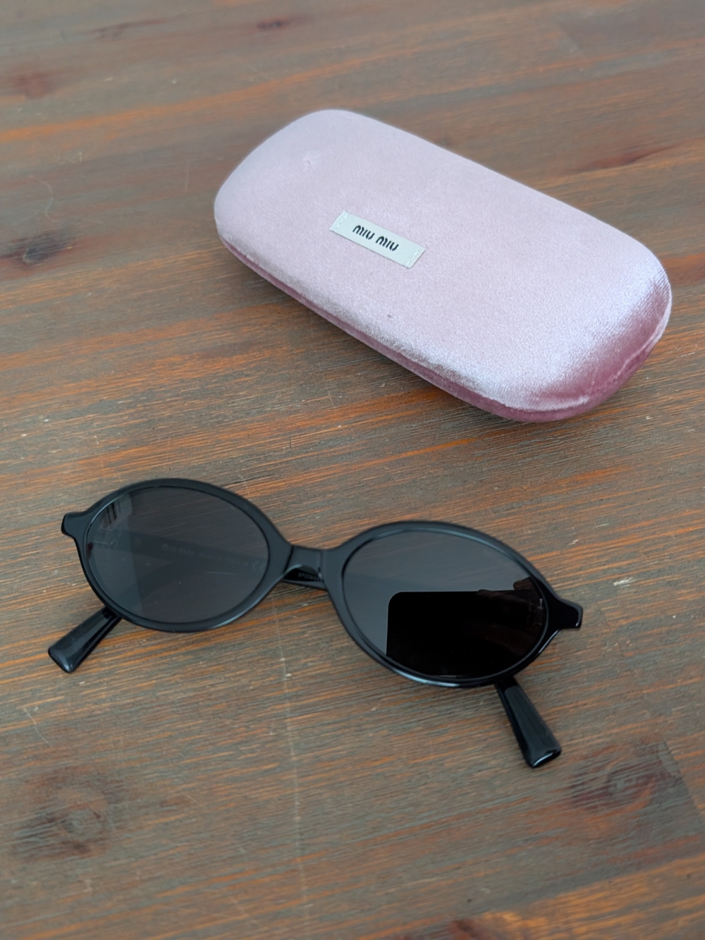 Miu Miu Black Round Sunglasses with Pink Case